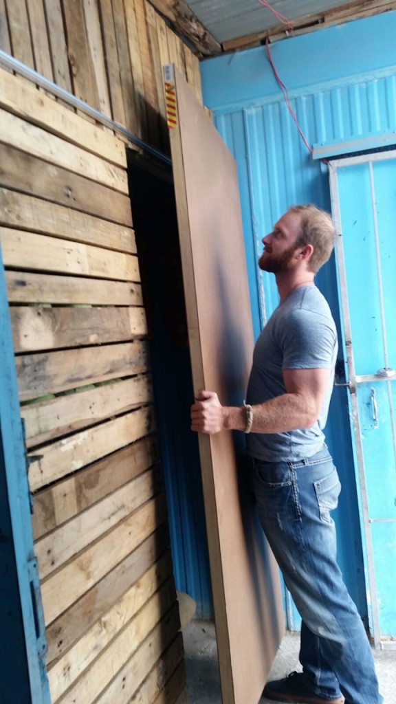 Putting on the final touches of the vegetable shed