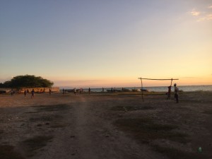 A futbol game at sunset beside the ocean. It's too bad softball was more of my thing than soccer. I was more of one for the hand-eye coordination games than the foot-eye coordination. 