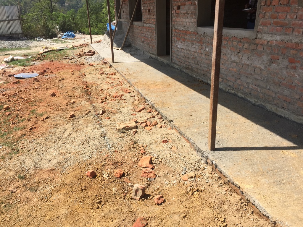 The sidewalk.
