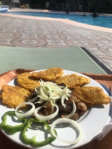 Poolside lunch of griot (pork) and plantains! 