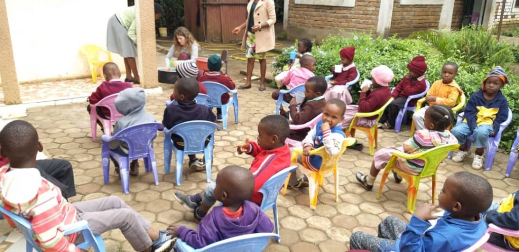 Serving porridge to the school.